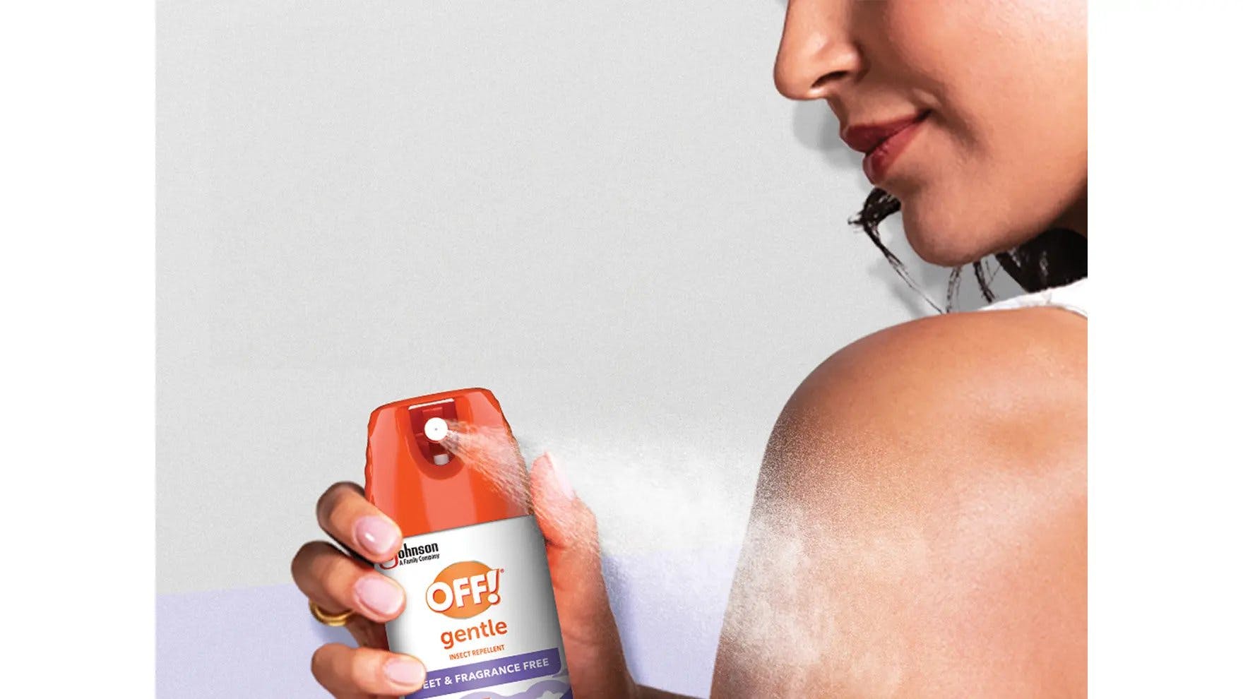 Woman spraying her shoulder with OFF! Gentle Insect Repellent  